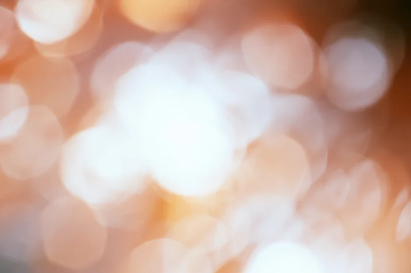 Warm bokeh lights blurred in soft focus as background