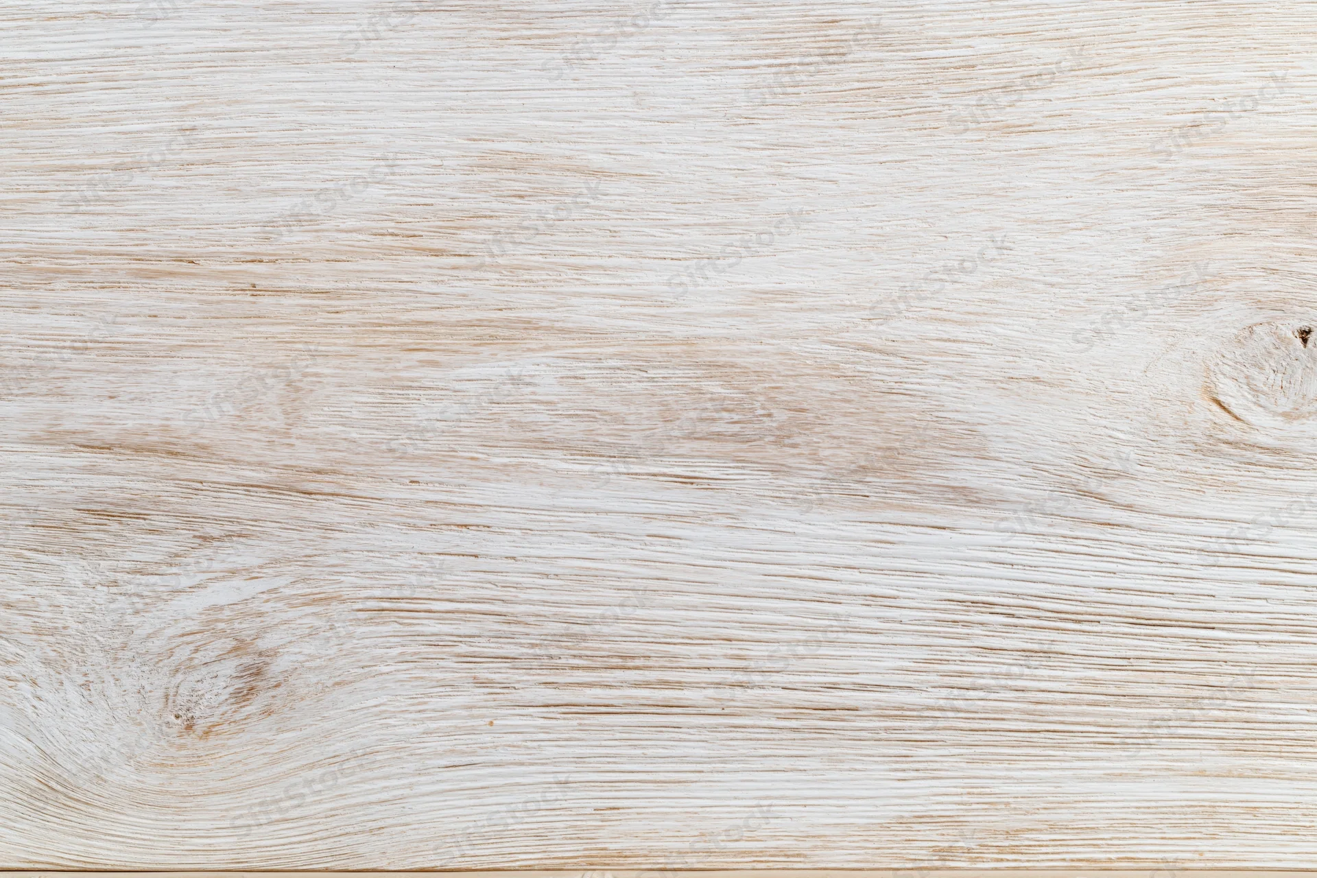 Whitewashed wooden board surface in flat lay closeup view