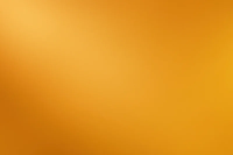 Smooth matte painted orange wall surface filling the frame