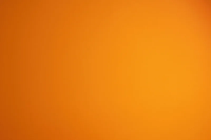 Warm amber-orange gradient background with smooth color transition from left to right