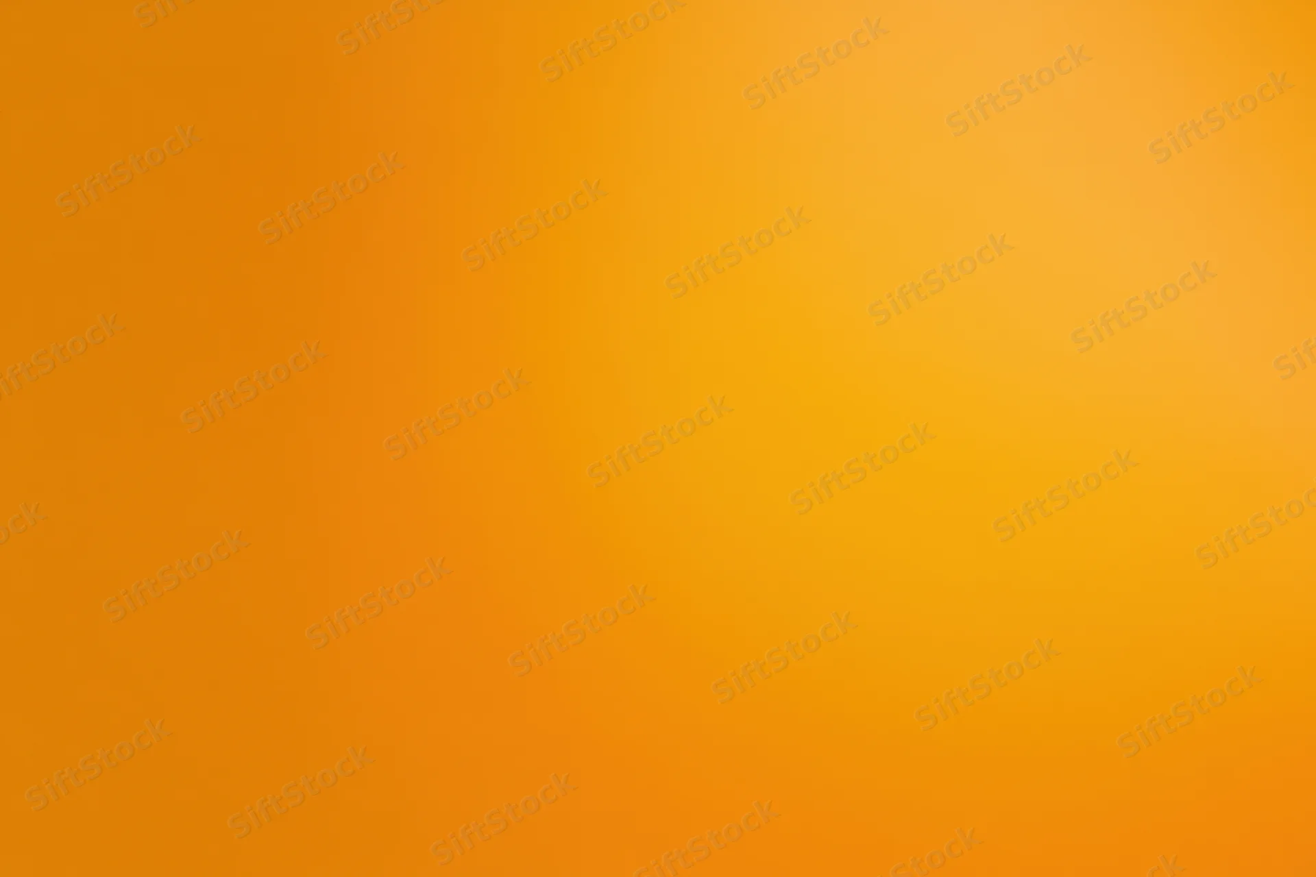 Warm amber-orange gradient background transitioning from light to dark across the frame