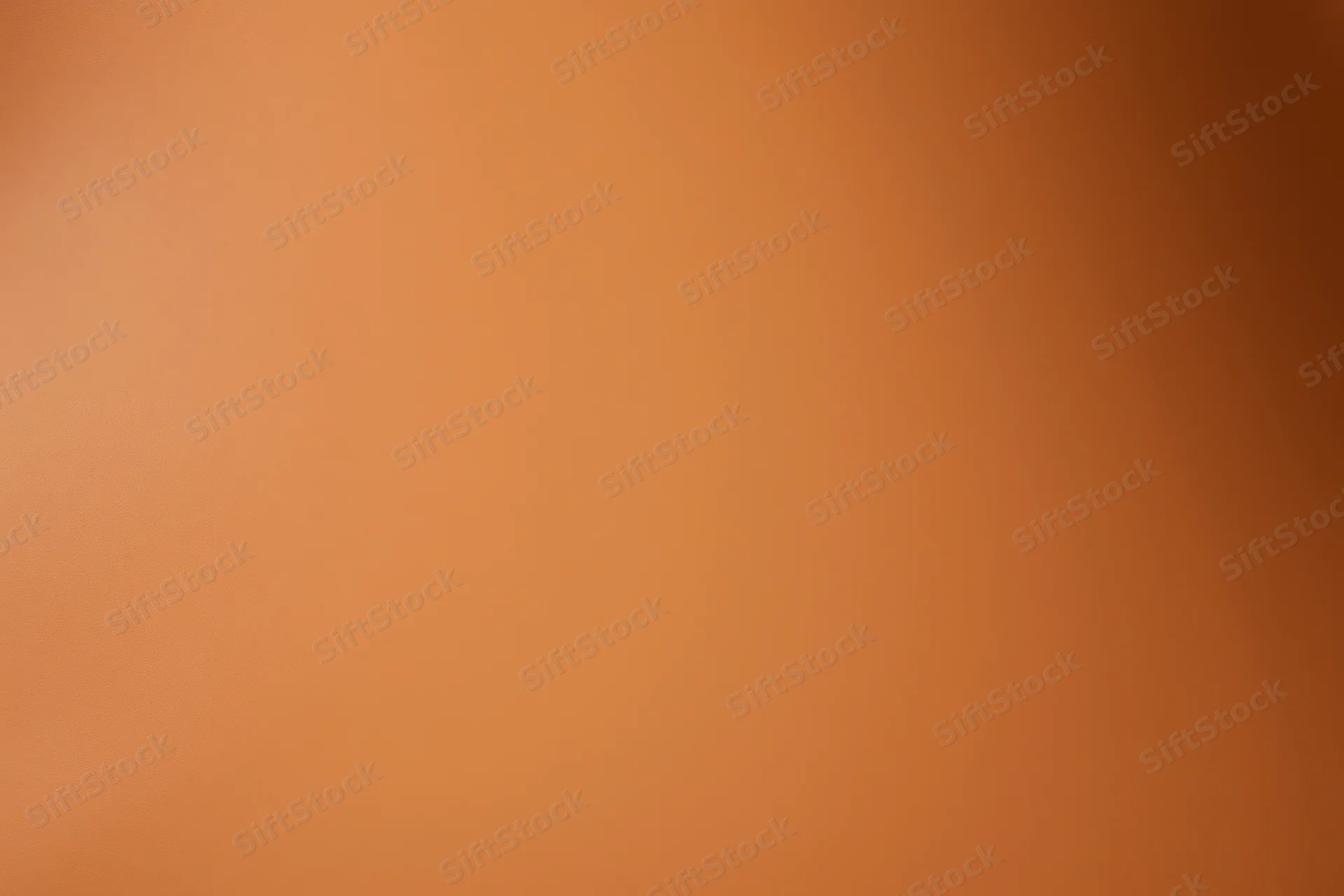 Warm amber-orange gradient background with smooth flat texture