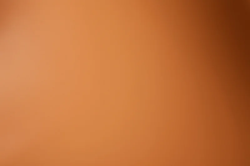 Warm amber-orange gradient background with smooth flat texture
