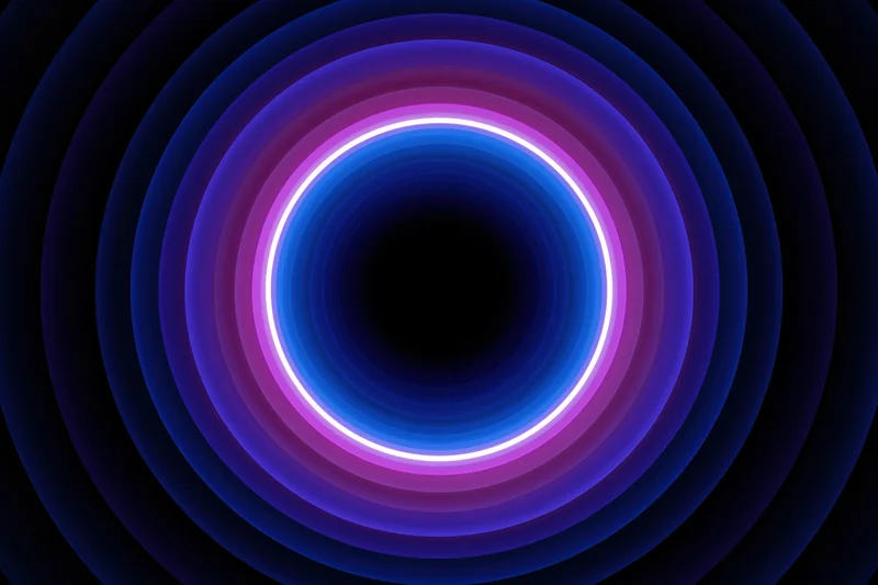 Glowing neon ring centered in a deep tunnel of concentric circles