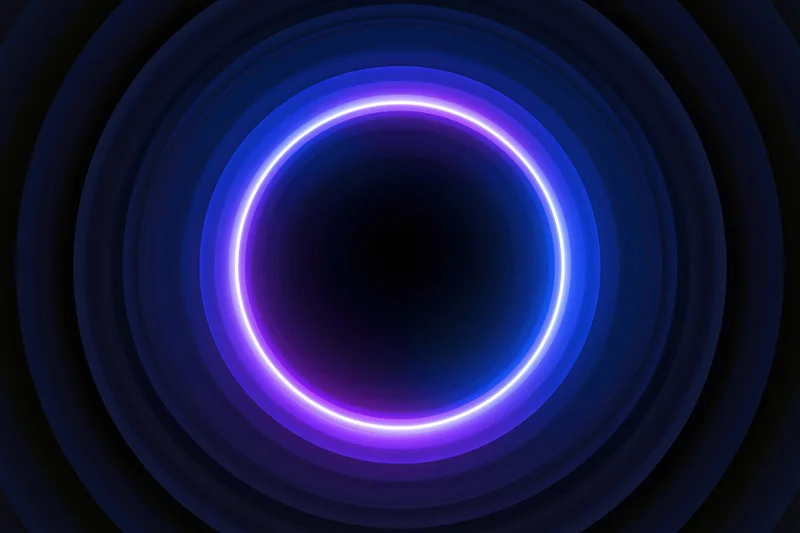 Glowing neon ring centered in a deep tunnel of concentric circles