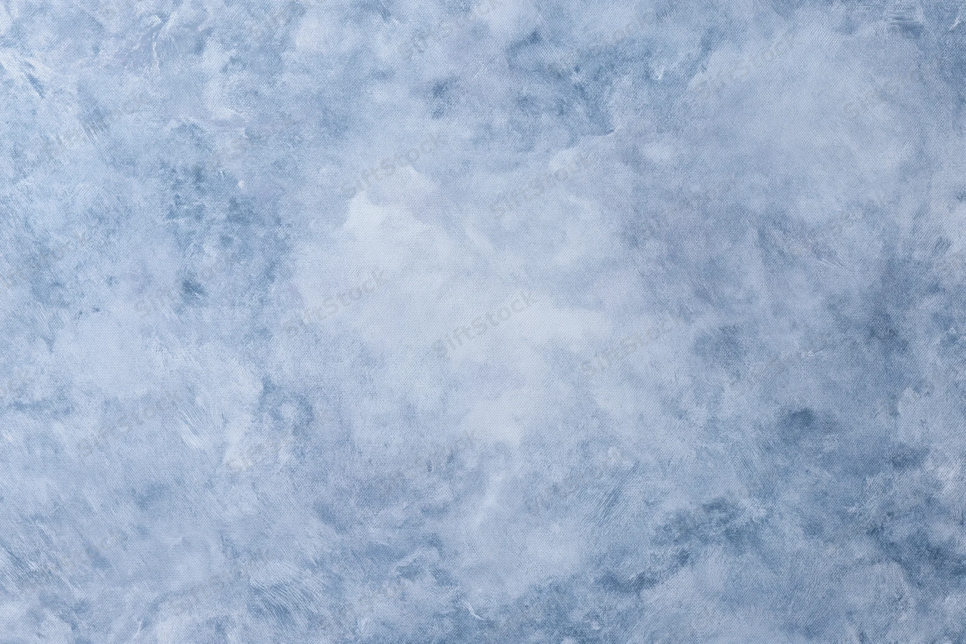Hand-painted canvas backdrop with soft mottled blue texture for photography studio use