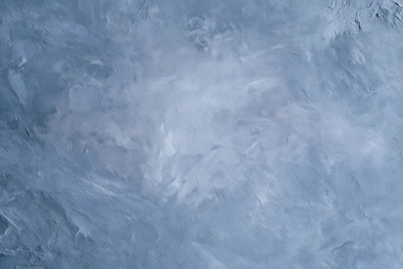 Hand-painted canvas backdrop with soft mottled blue-gray texture for photography studio use