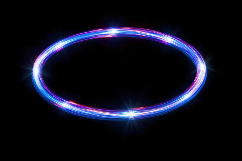 Glowing circular light ring formed by long-exposure light painting against black background