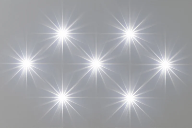 Six bright white lens flare star bursts arranged in two rows