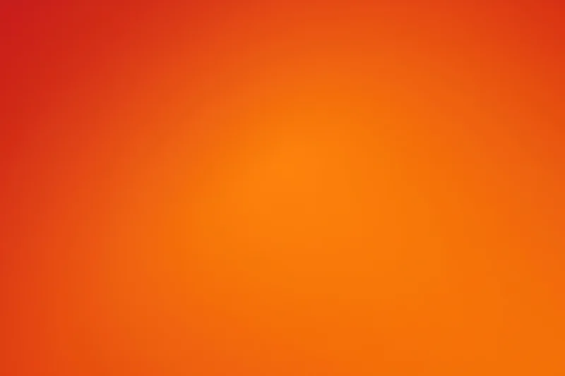 Smooth gradient background transitioning from deep red to bright orange