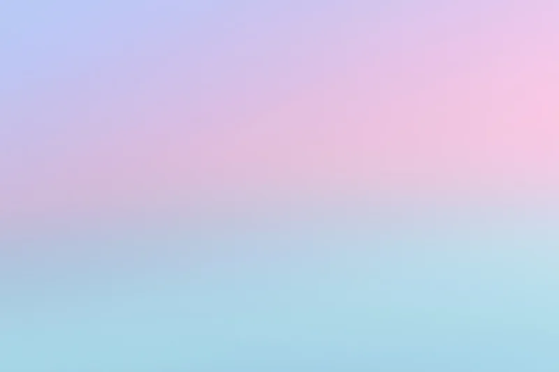 Smooth pastel gradient transitioning from pink to blue across the frame