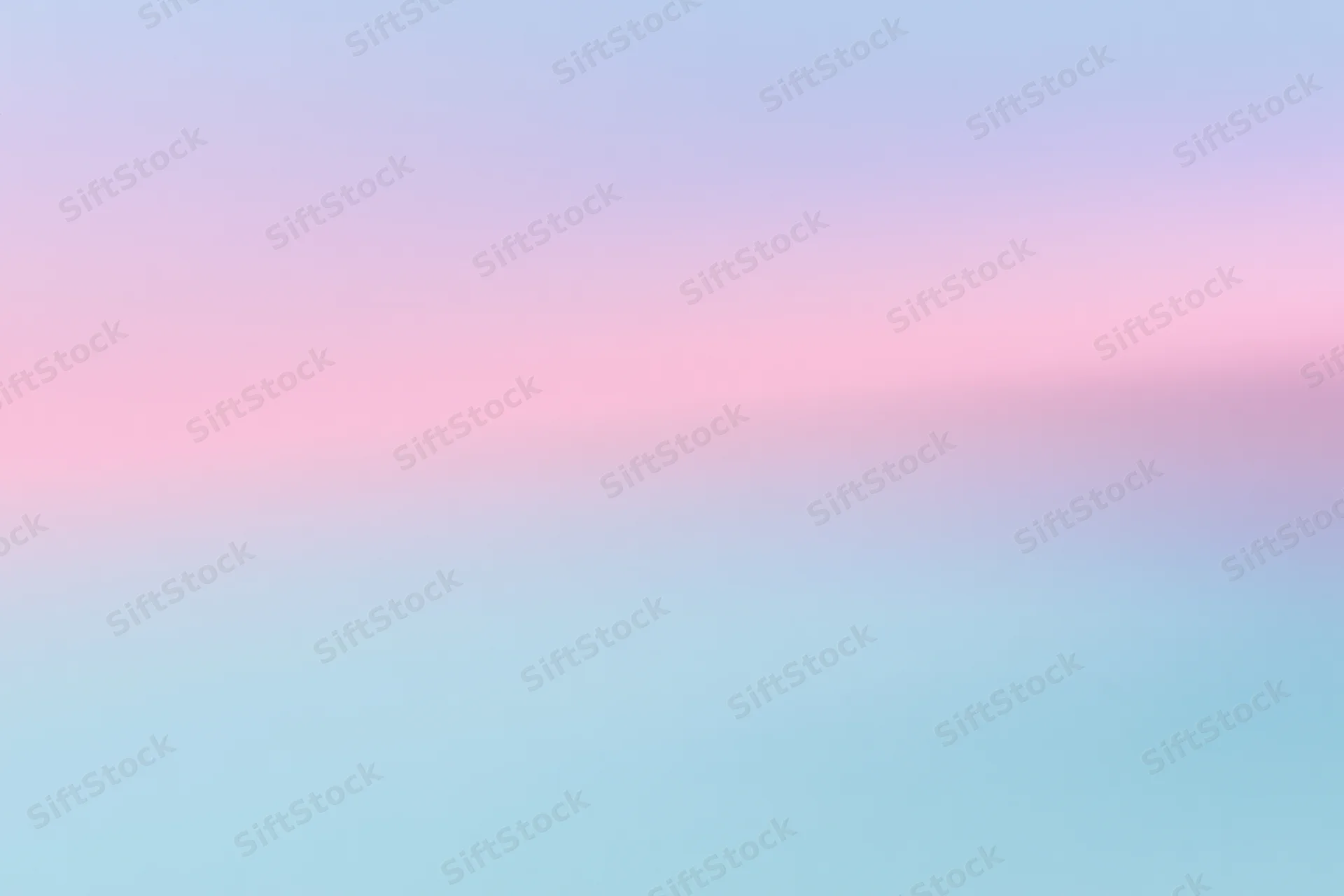 Smooth pastel gradient transitioning from pink to blue across the frame