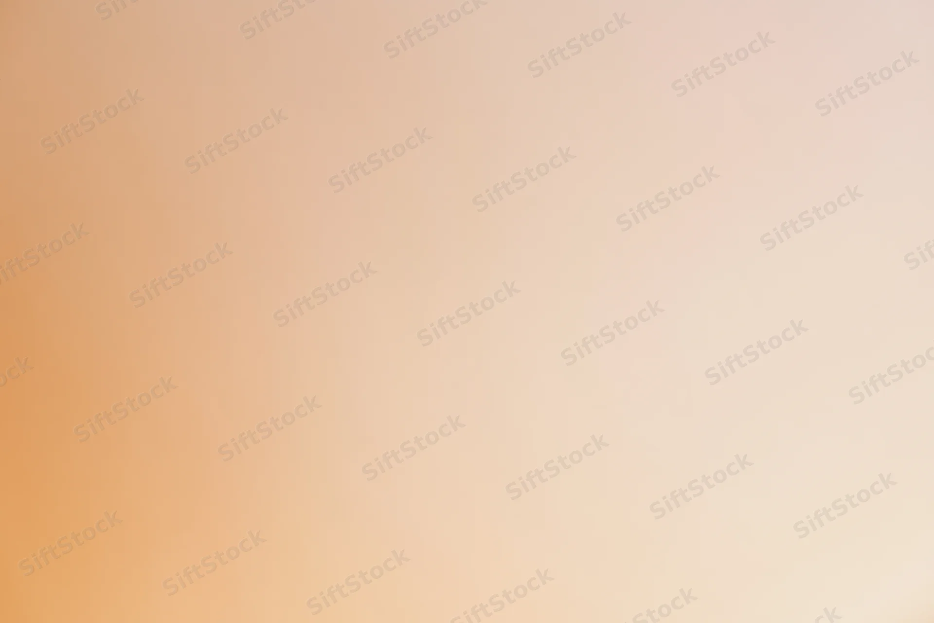 Smooth gradient background transitioning from warm peach to light orange