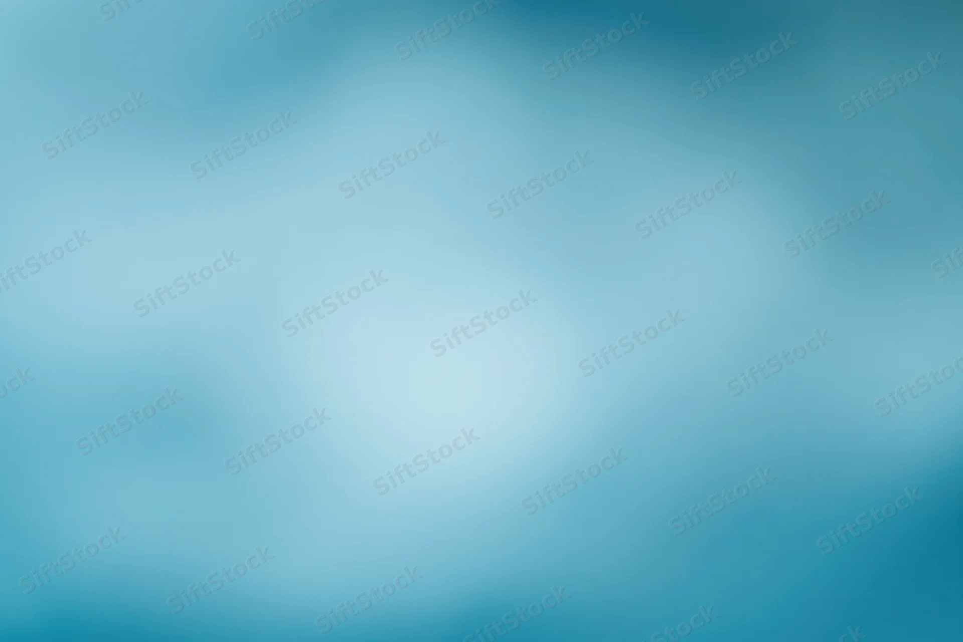 Smooth out-of-focus blue gradient background with soft light transition