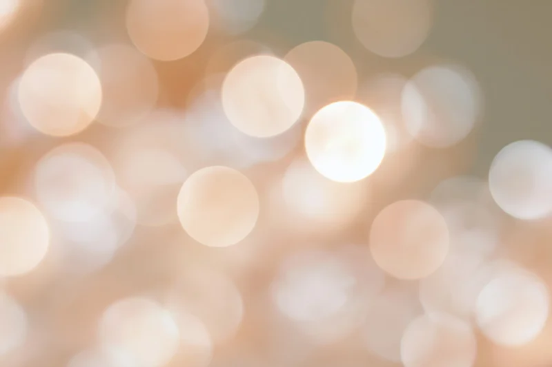 Soft abstract bokeh background with large out-of-focus warm lights