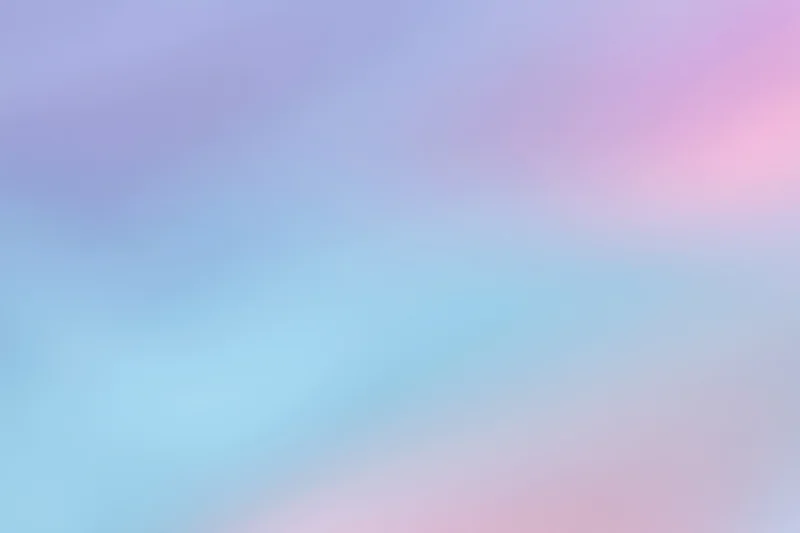 Soft blurred gradient background transitioning from pink and purple to blue and cyan