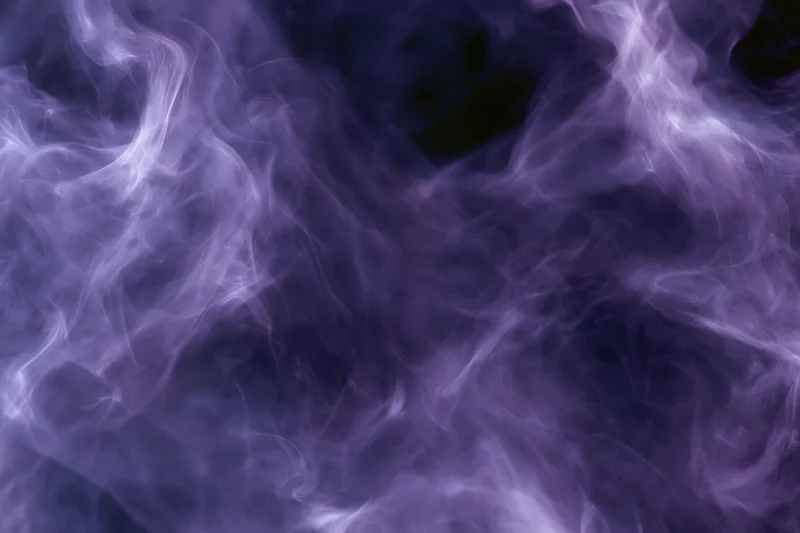 Swirling purple smoke filling the frame as an abstract background