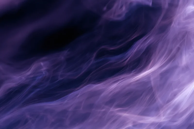 Swirling purple smoke filling the frame as an abstract background