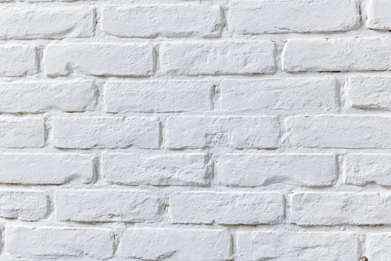 White-painted brick wall filling the frame as a seamless textured background