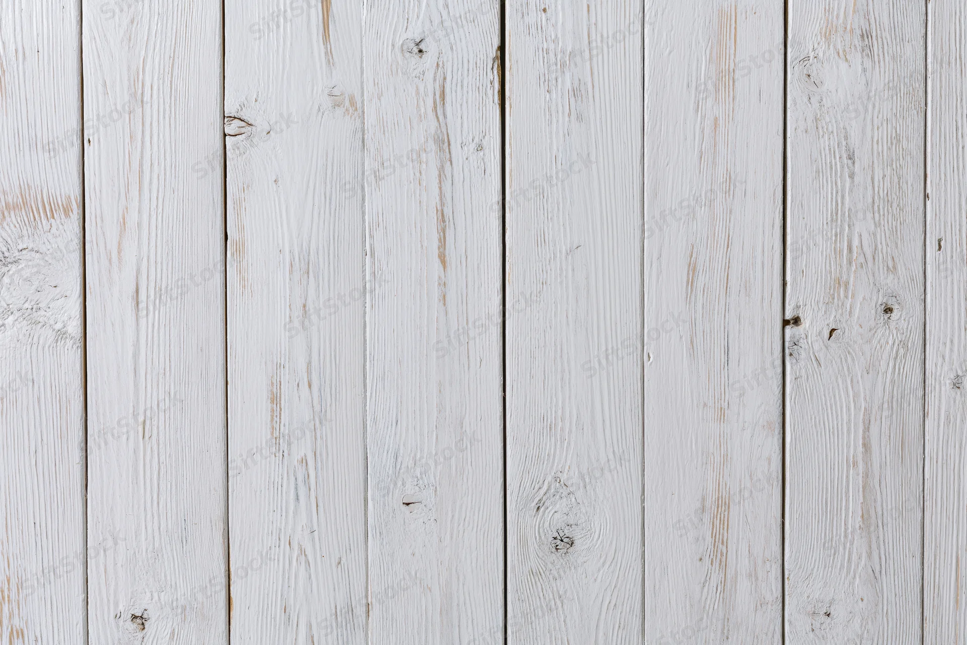 White-painted wooden planks arranged vertically filling the frame