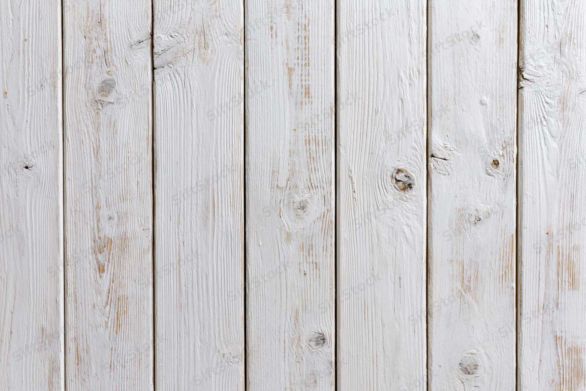 White-painted wooden planks arranged vertically filling the frame