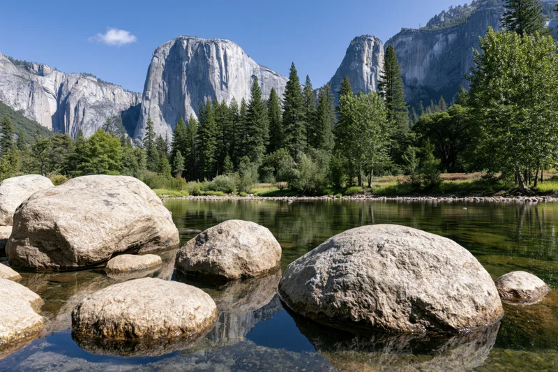 River view of granite cliffs and forest in yosemite valley