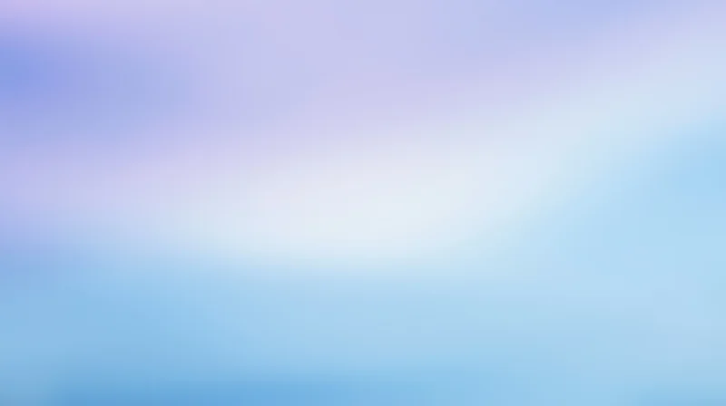 Soft gradient of blue and purple hues blending into a smooth abstract background