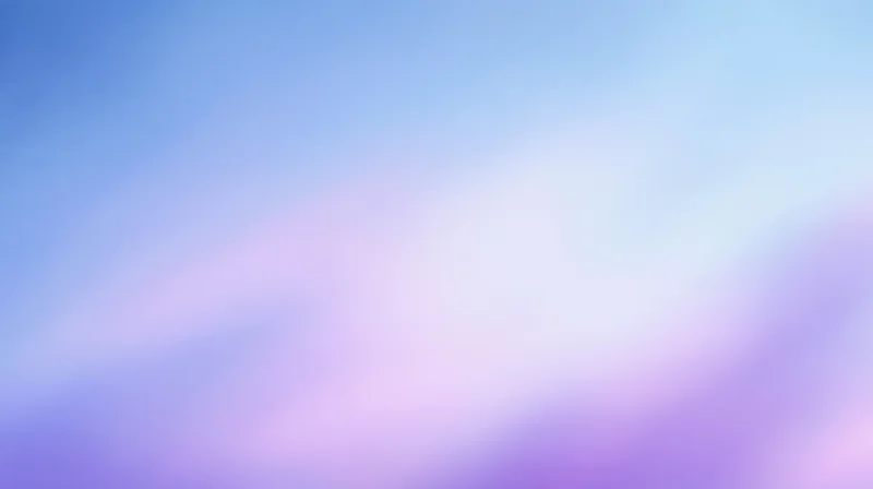 Soft gradient of blue and purple hues blending across the frame as a smooth abstract background