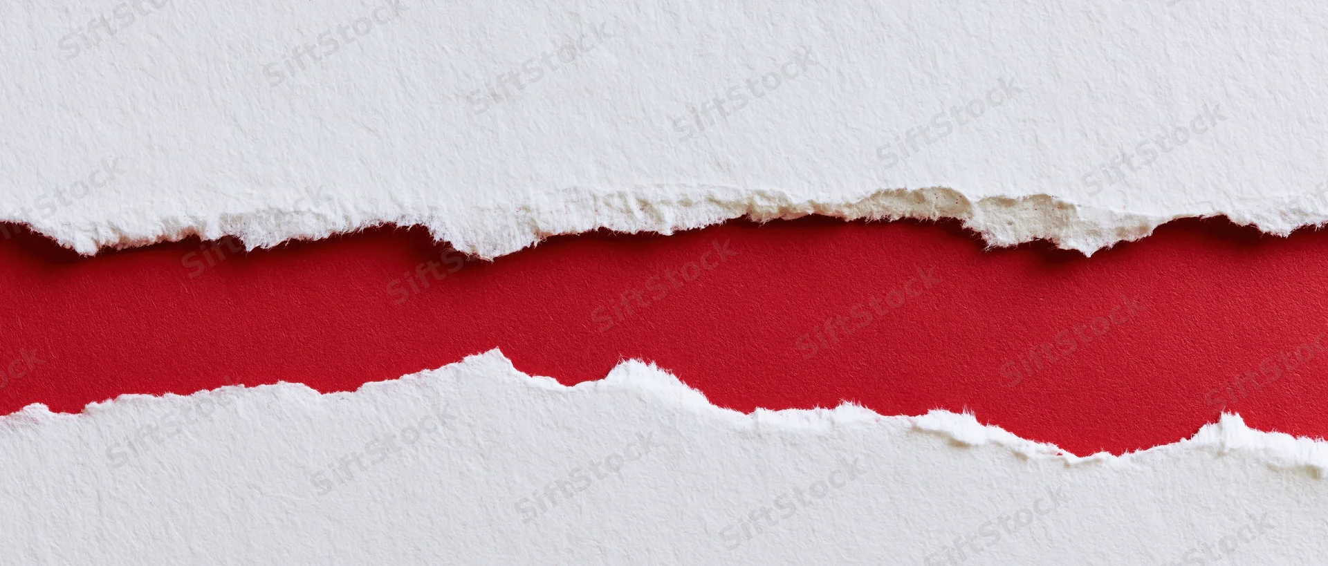 Torn white paper revealing a red strip beneath, creating a layered abstract background