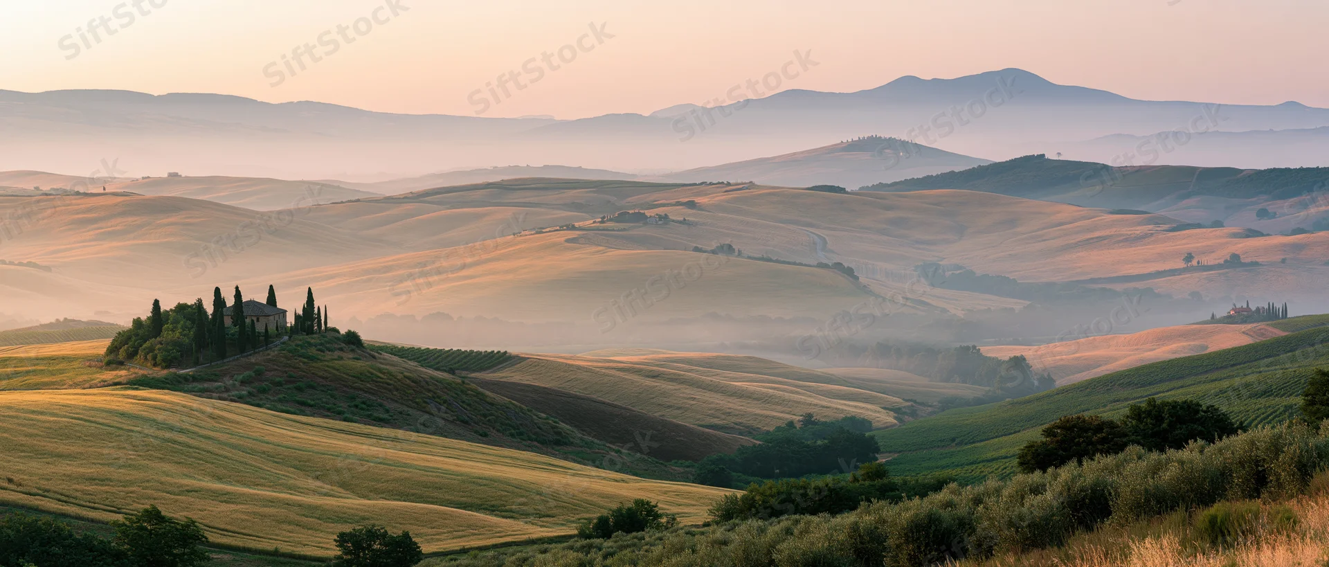 Rolling hills of tuscany at sunset with cypress trees and a stone chapel on a hilltop, surrounded by vineyards and olive groves