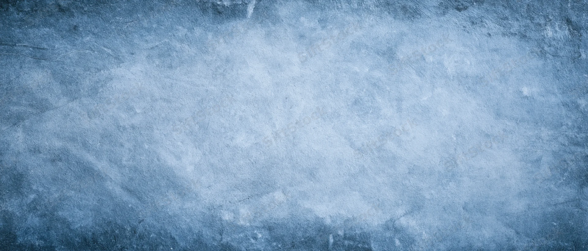 Textured blue-gray concrete surface with frosty weathered appearance