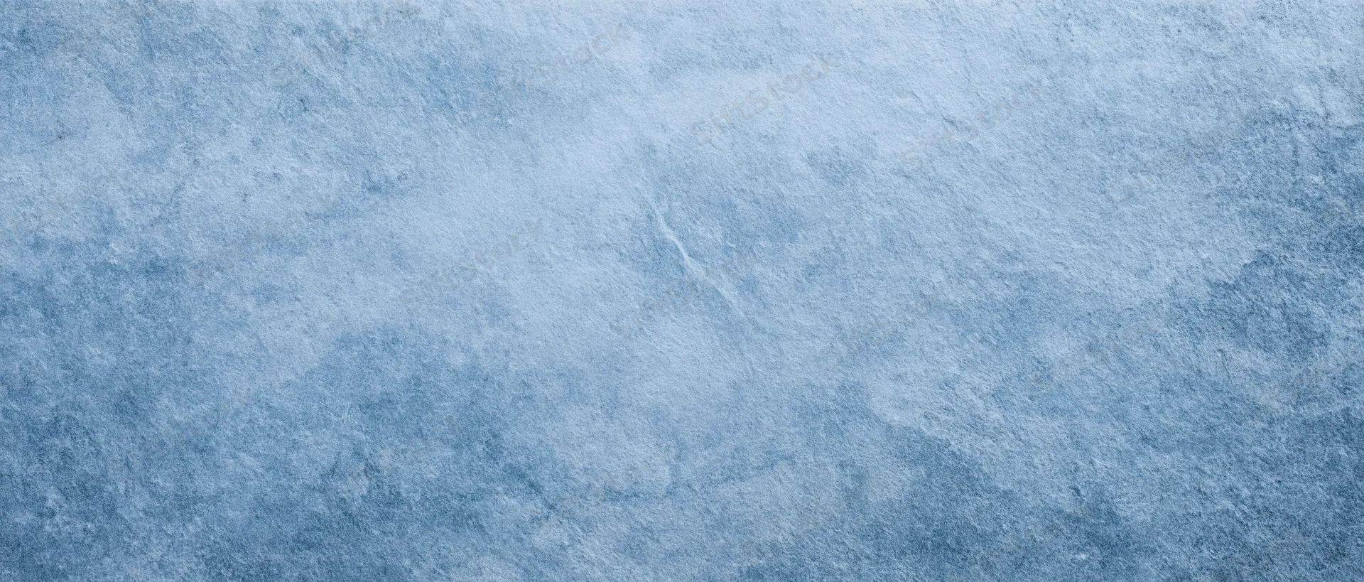 Textured blue stone surface with subtle variations in tone and roughness
