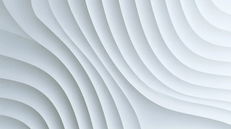 White wavy curved panels arranged in layered geometric pattern on interior wall