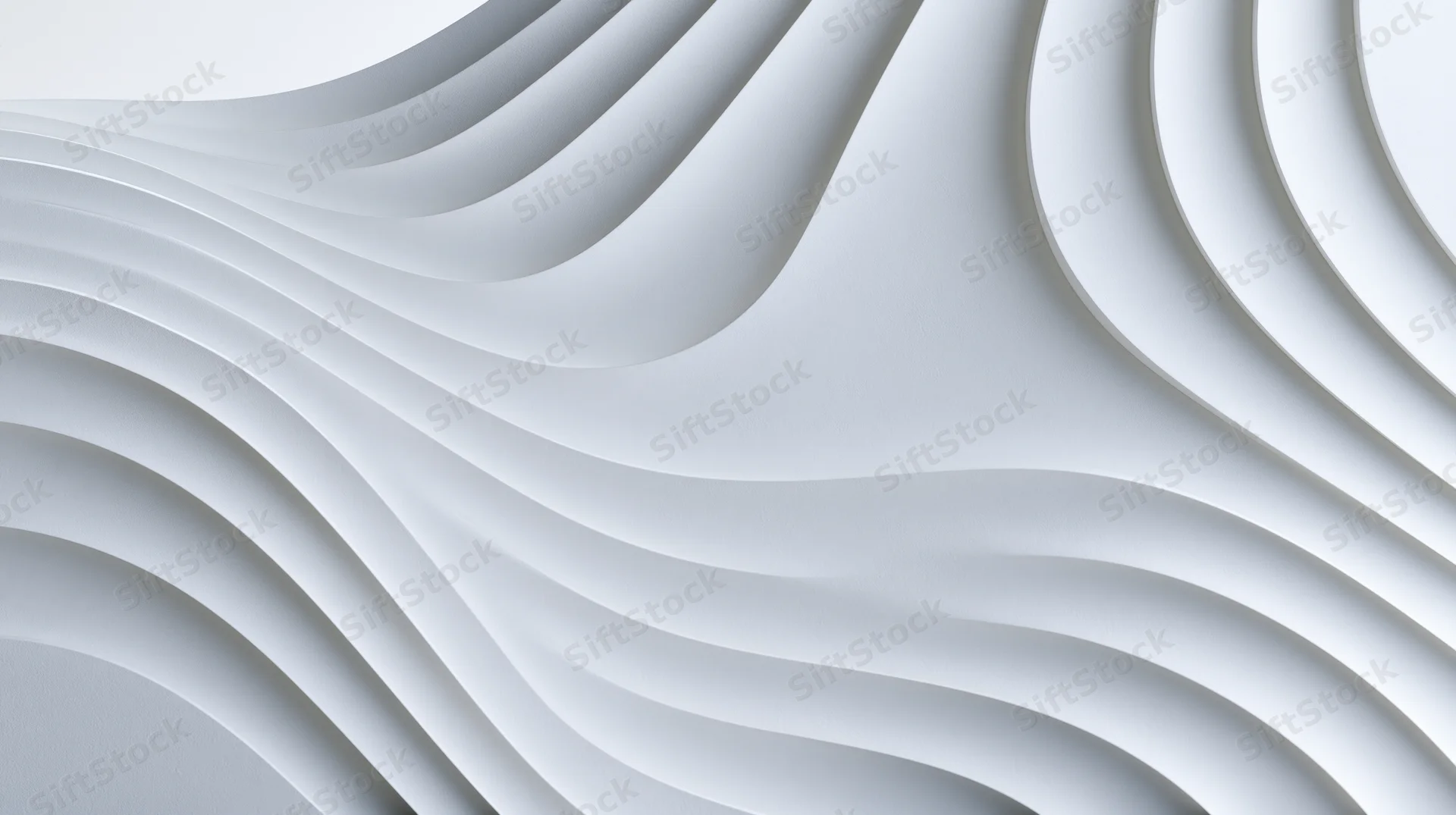 Flowing white curved layers forming a textured abstract surface