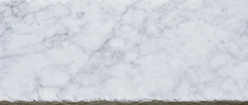 White veined marble slab with polished surface and natural stone texture for interior design