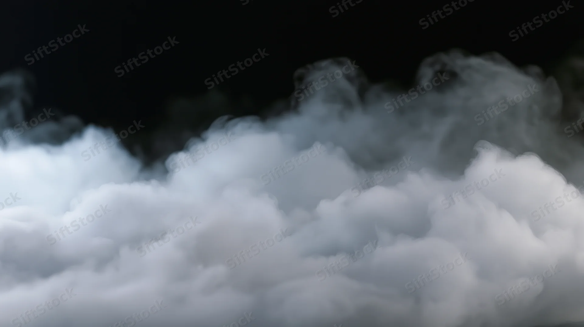 Swirling white smoke rising against a dark background with soft edges and billowing clouds