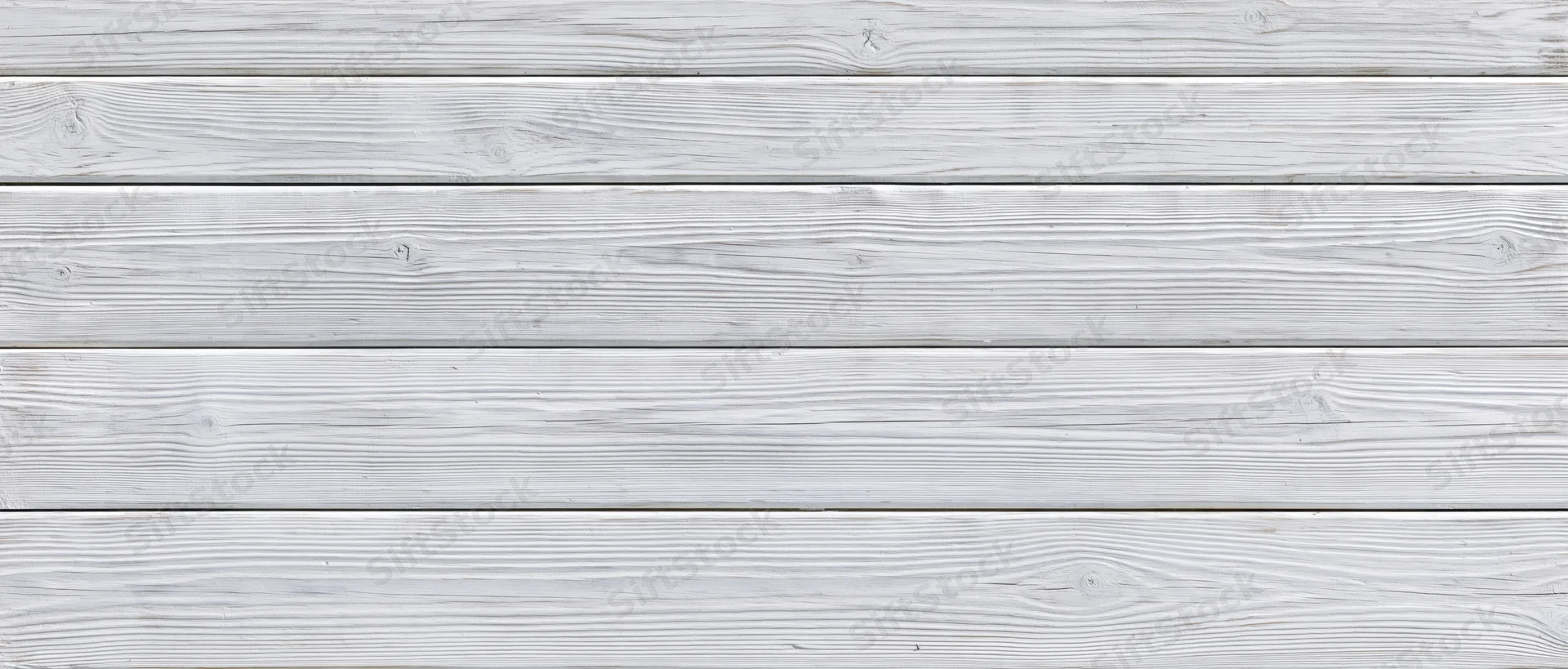 Horizontal white wooden planks arranged in a seamless pattern as a textured background