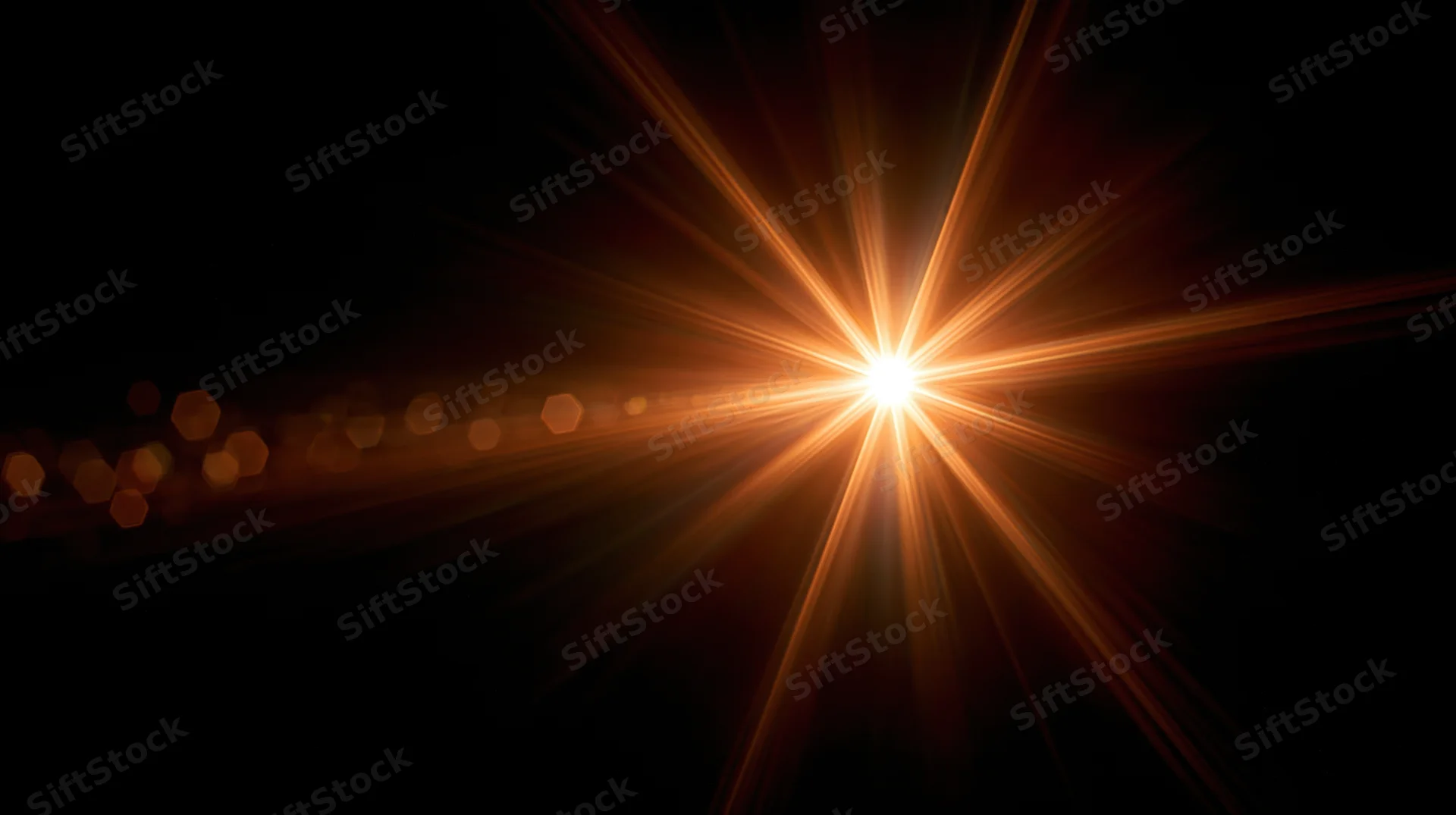 Bright starburst light flare radiating from center against dark background with bokeh highlights
