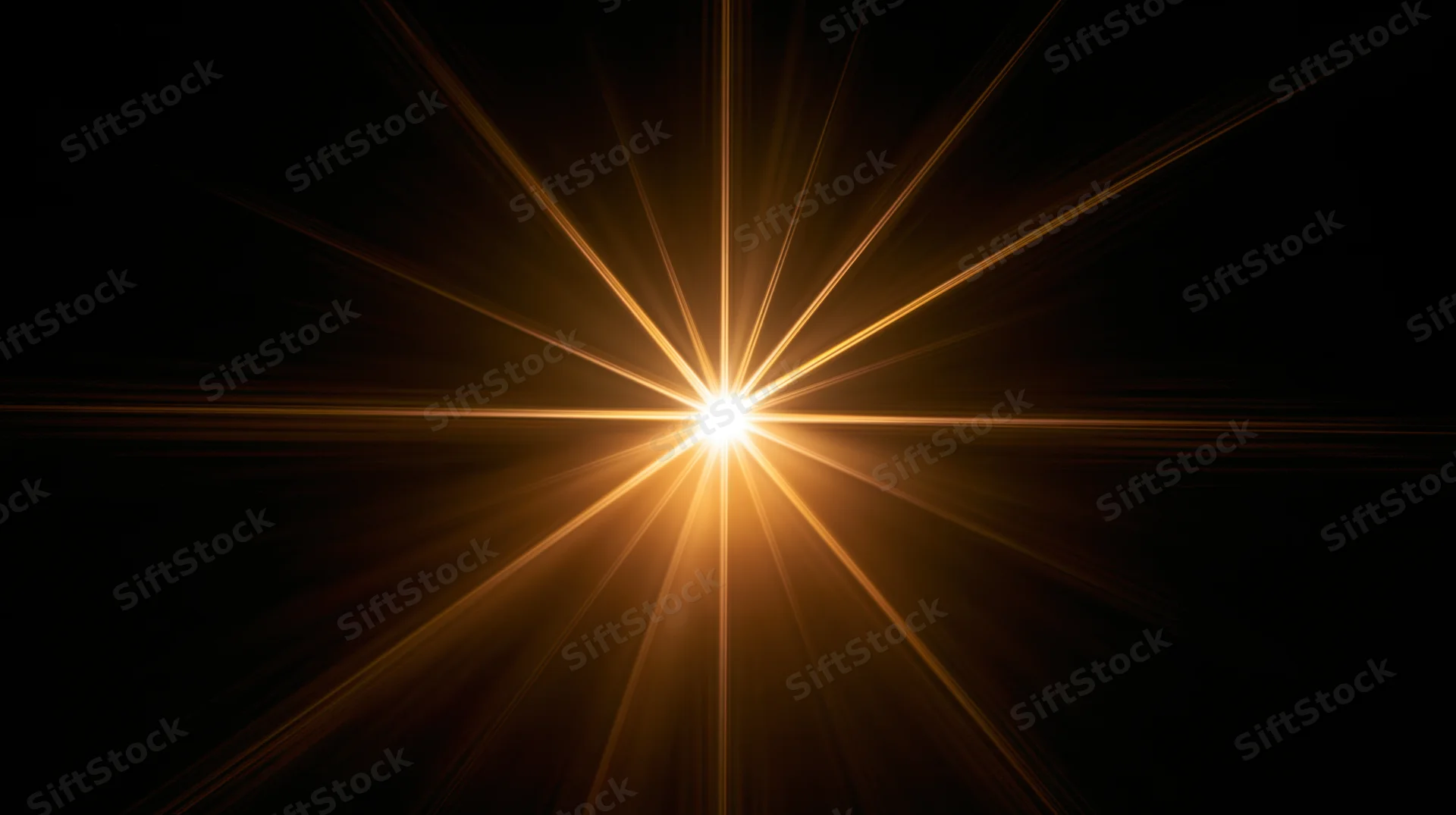 Bright golden starburst light radiating from center against black background