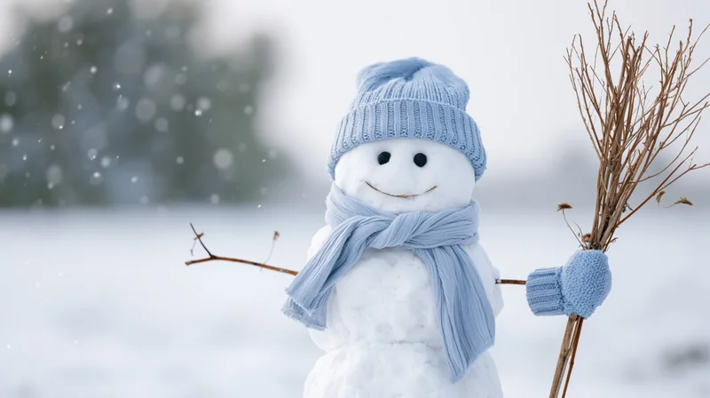 Smiling snowman wearing blue knit hat and scarf holding branches in snowy winter landscape