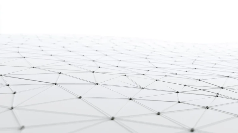 A white wireframe network of connected nodes forming a geometric surface with copyspace