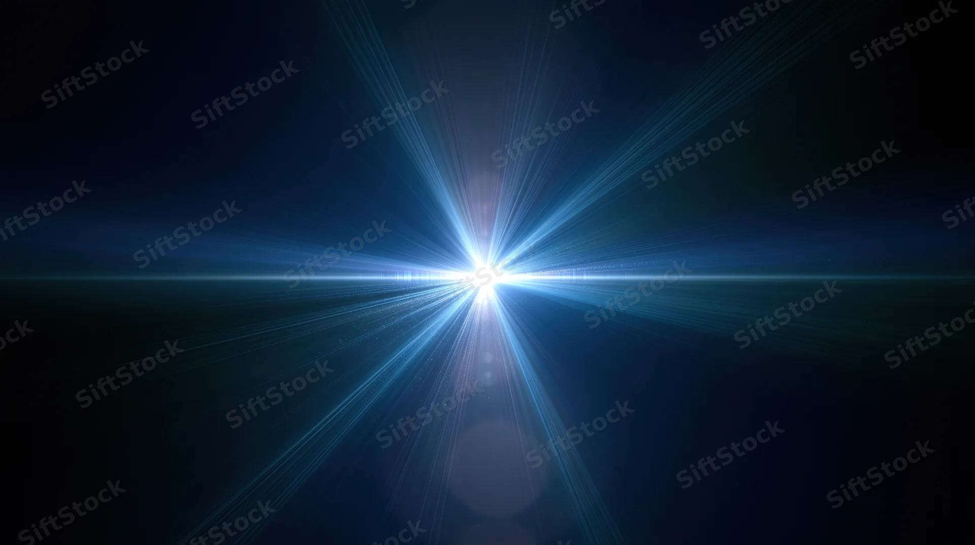Bright blue light burst radiating from center against dark background with lens flare and copyspace