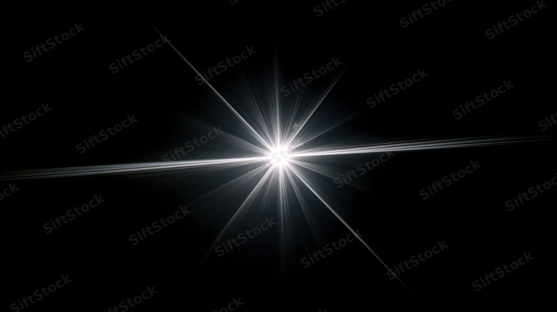 Bright starburst light flare radiating from center against black background