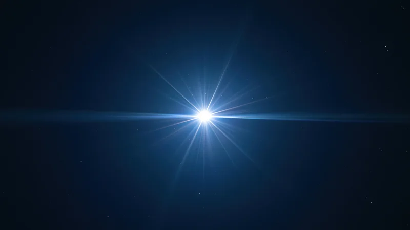 Bright star shining in dark night sky with lens flare and scattered stars