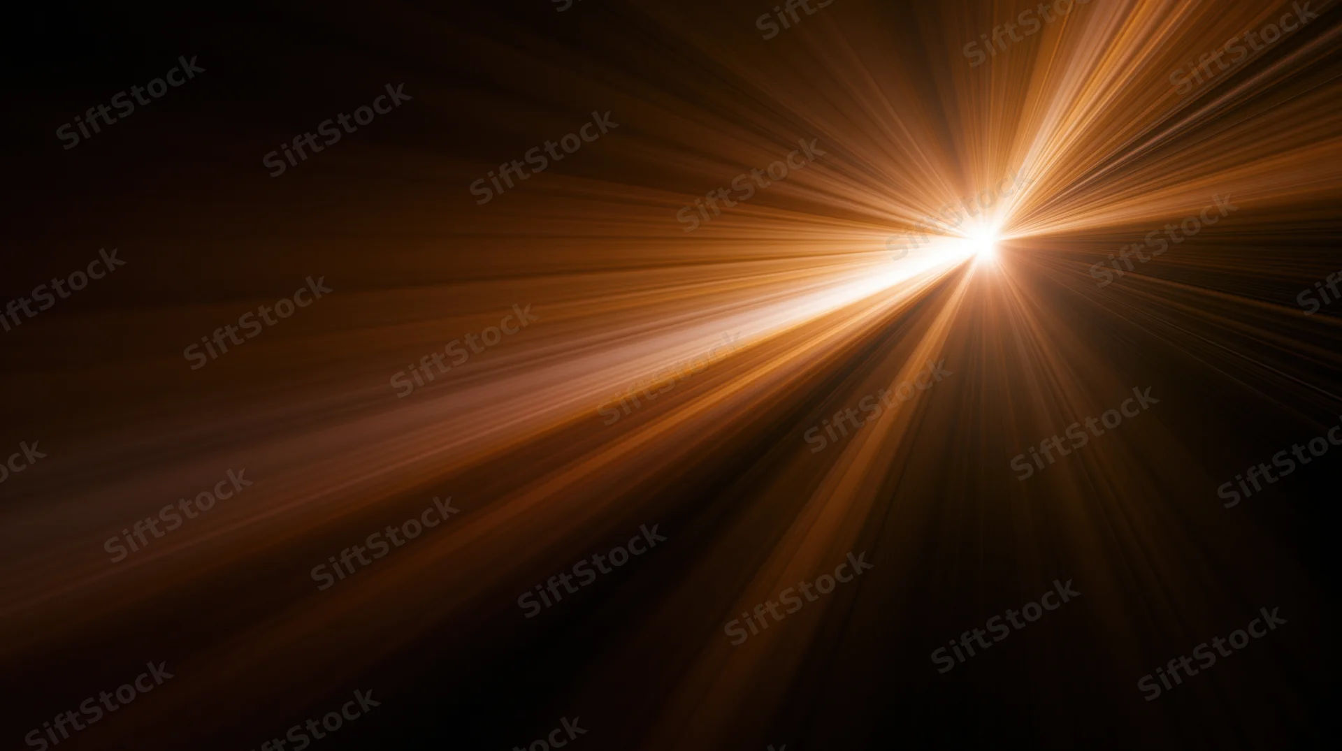 Radiant light burst emanating from a central point in dark space