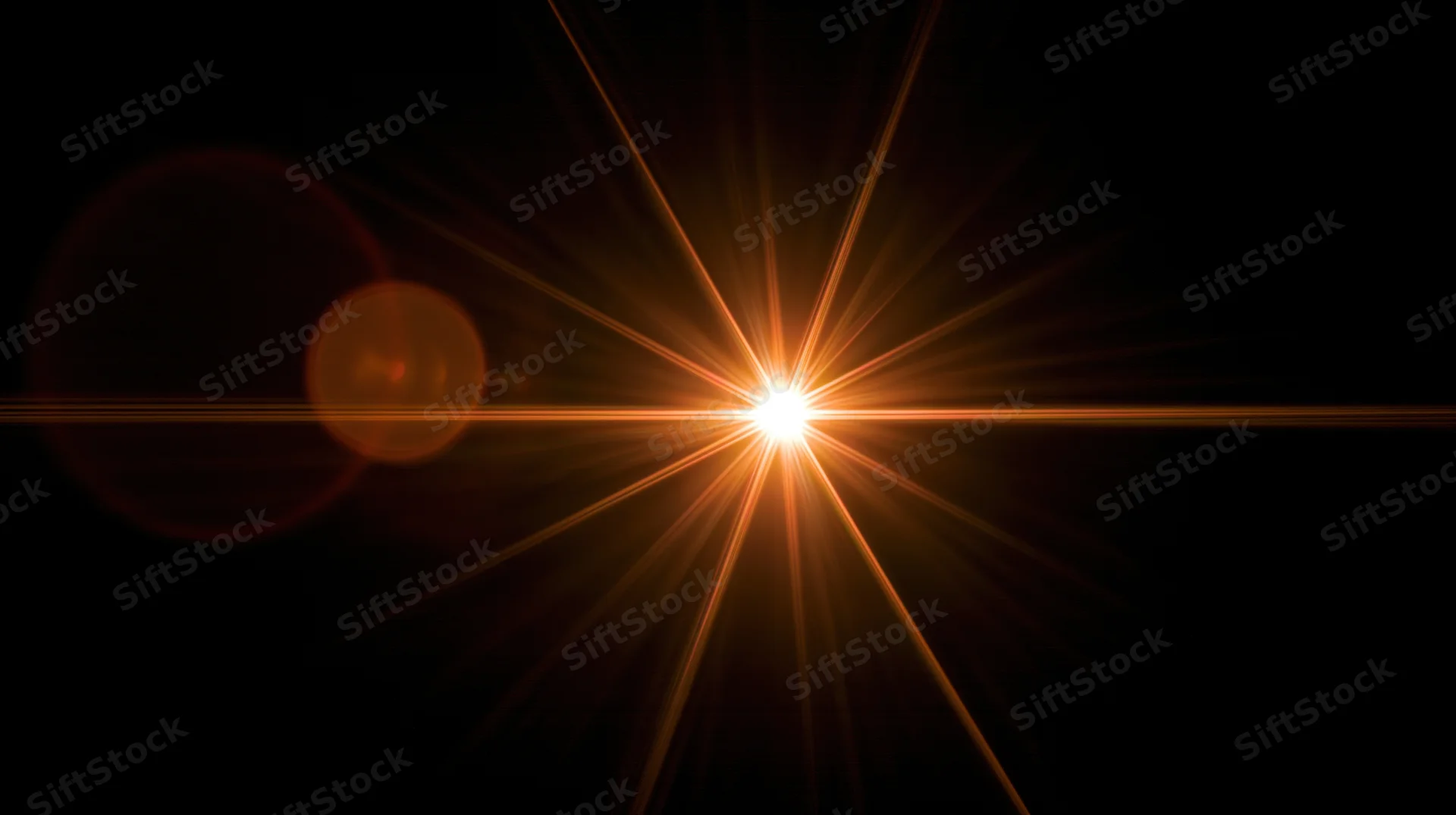 Bright starburst light flare radiating from center against dark background with copyspace