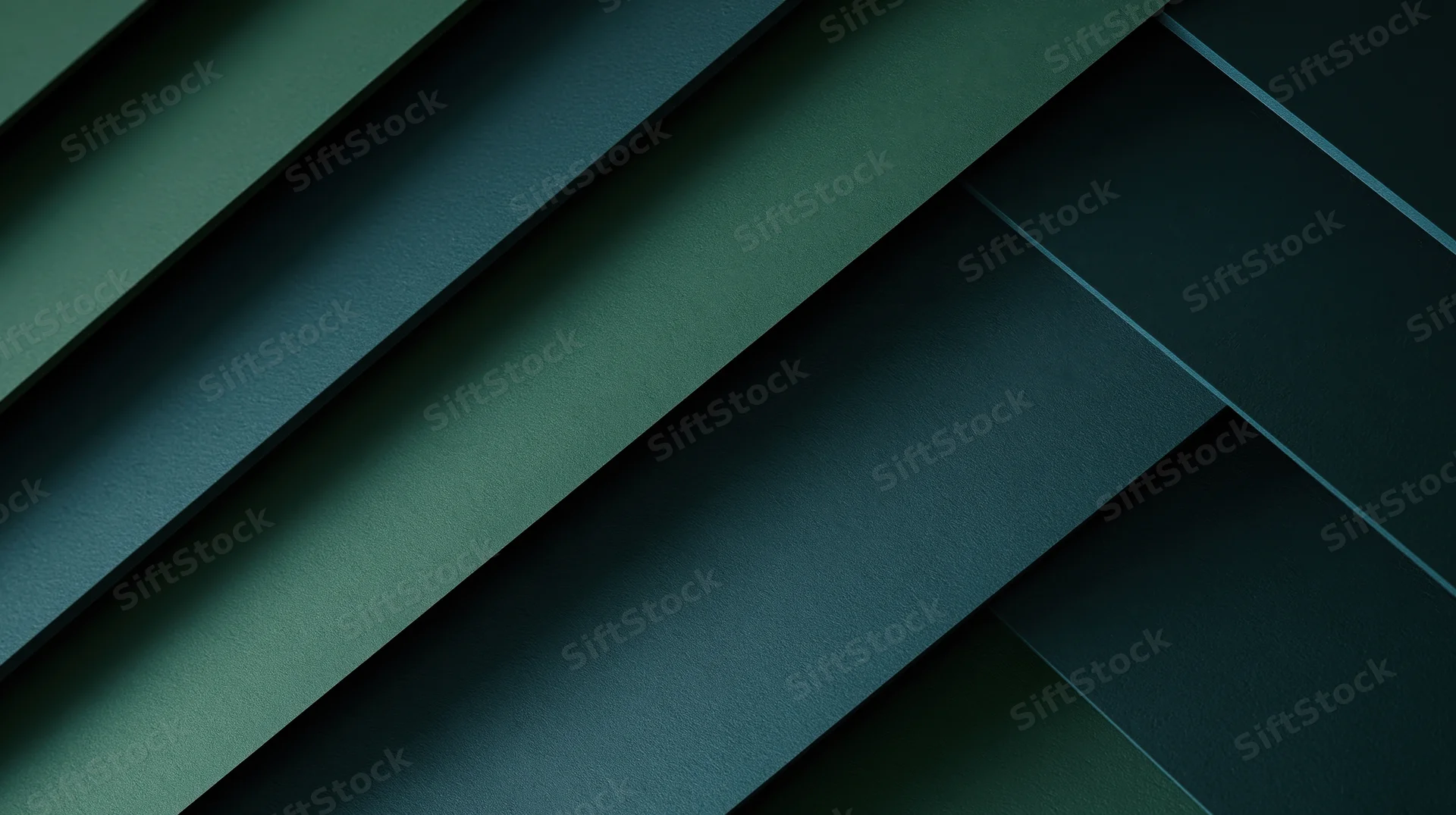 Layered diagonal green and teal geometric shapes forming an abstract pattern with depth and shadow