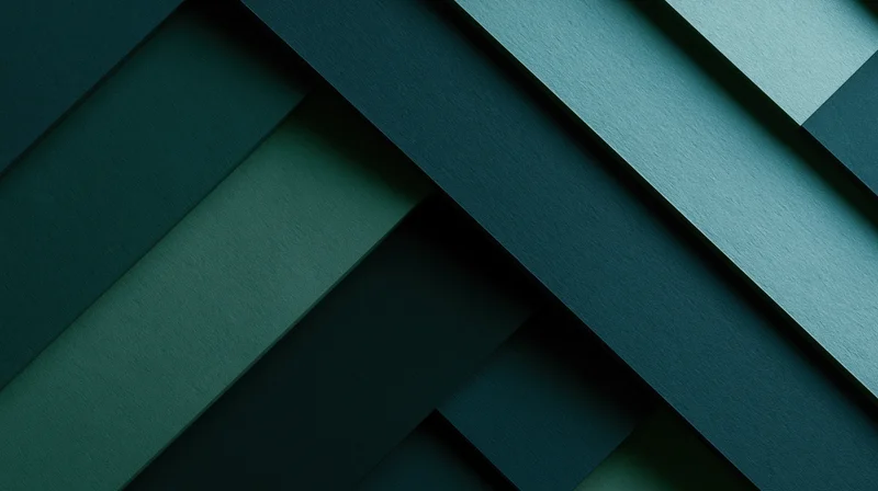 Layered geometric shapes in varying shades of teal and green arranged diagonally across the frame