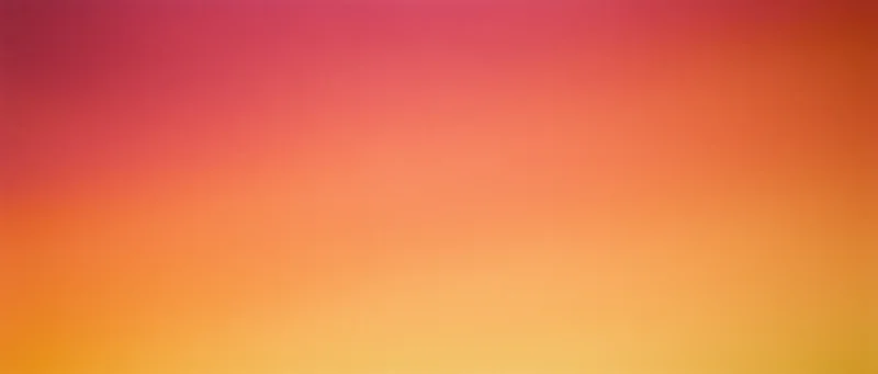 Smooth color gradient transitioning from pink and red at the top to orange and yellow at the bottom