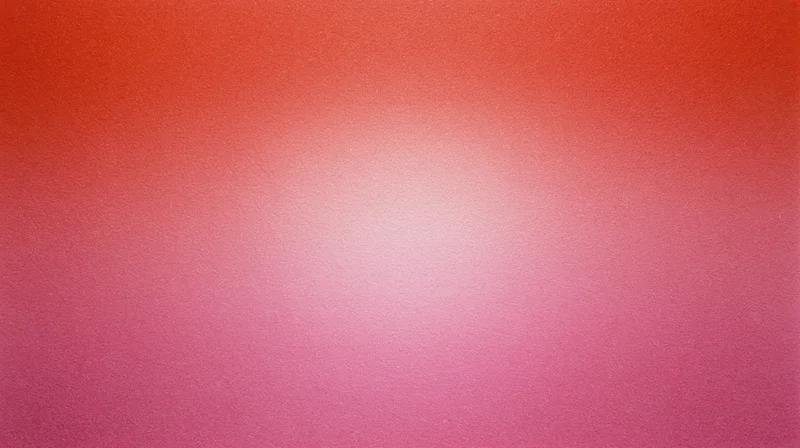 A smooth red to pink color gradient background with soft light transition
